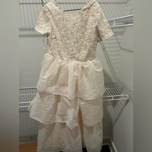 This is a brand new Nee See Design dress